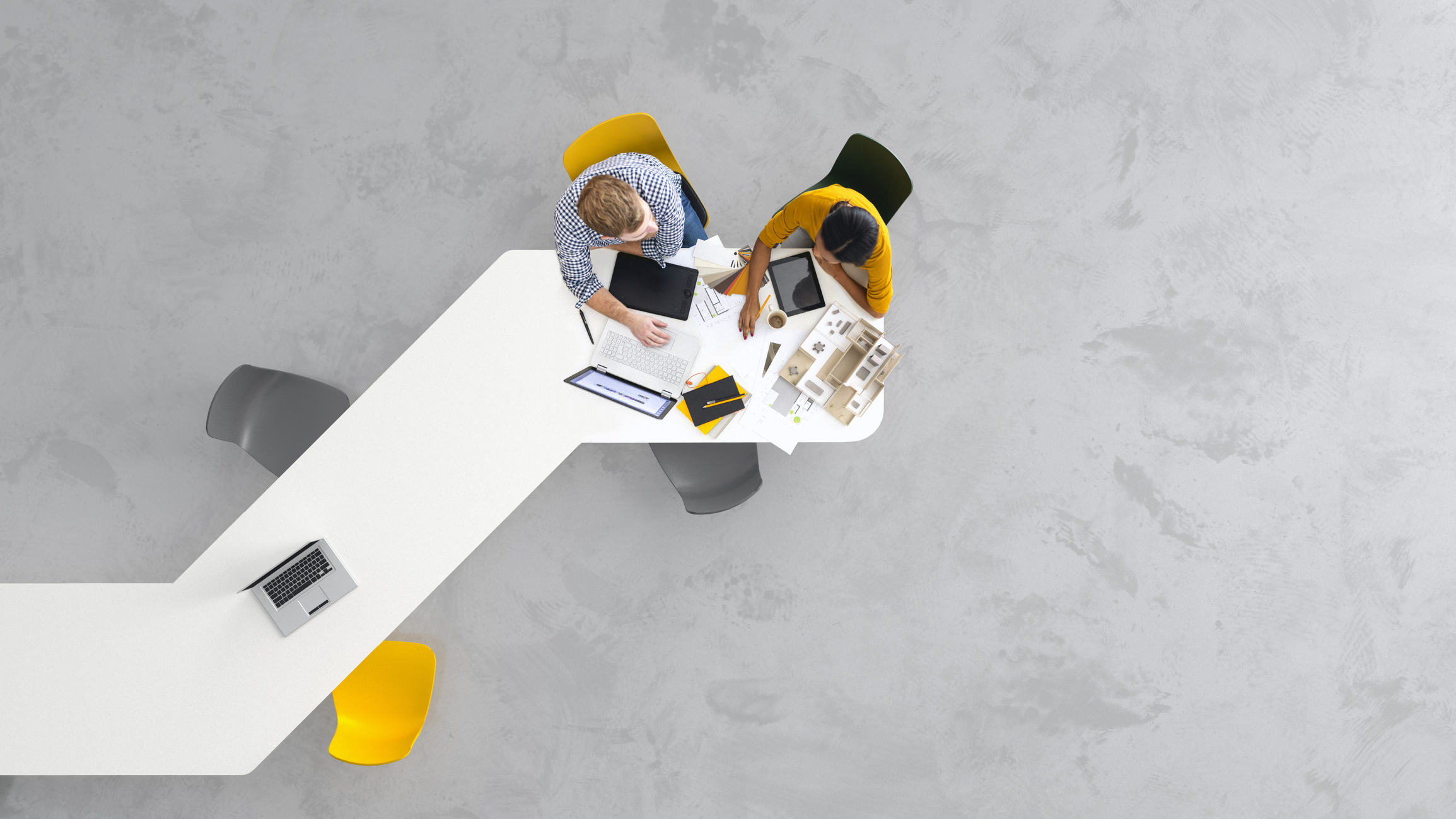 modern angular desk with workers, shot from above